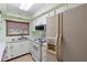 Functional kitchen with bright cabinets, an oven, and lots of counter space at 507 Sand Ave, Apopka, FL 32703