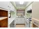 Functional kitchen with bright cabinets, an oven, and lots of counter space at 507 Sand Ave, Apopka, FL 32703