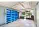 Large room with built-in shelves and access to screened-in lanai at 507 Sand Ave, Apopka, FL 32703