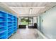 Large storage room with easy access to the back yard and built-in storage at 507 Sand Ave, Apopka, FL 32703