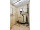 Small utility room with performance water heater and utility sink at 507 Sand Ave, Apopka, FL 32703