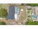 Aerial view of a home with a pool, fenced backyard, and mature landscaping at 510 Apollo Ave, Deltona, FL 32725