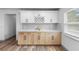 The kitchen showcases bright white cabinets, new hardware, sleek quartz countertops, and modern stainless steel appliances at 510 Apollo Ave, Deltona, FL 32725