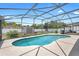 A beautiful backyard pool with an enclosure, offering a private outdoor oasis at 510 Apollo Ave, Deltona, FL 32725