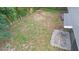 Aerial view of the backyard featuring a wooden fence, patio area, and plenty of space for entertaining at 5204 Van Aken Dr, Orlando, FL 32808