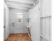 Finished basement with utility connections and storage, white painted walls, and tile floor at 5204 Van Aken Dr, Orlando, FL 32808