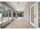 Enclosed back patio with lots of natural light at 570 Cypress Ave, Orange City, FL 32763
