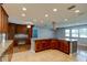 Large kitchen features cherry cabinets, recessed lighting, and an expansive island at 65 Sycamore Cir, Ormond Beach, FL 32174