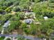 Beautiful aerial view of home nestled in a wooded neighborhood at 658 Westchester Dr, Deland, FL 32724