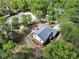 Bird's eye view of house showing the backyard, patio, and landscaped yard at 658 Westchester Dr, Deland, FL 32724