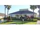 Charming community clubhouse with manicured landscaping and inviting curb appeal at 824 Casterton Cir, Davenport, FL 33897