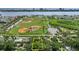 Aerial view of a home nearby baseball fields, and views of the waterfront at 832 Donnelly Pl, Daytona Beach, FL 32114