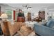 Cozy living room showcasing a TV, hardwood floors, and unique decorative pieces at 832 Donnelly Pl, Daytona Beach, FL 32114