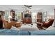 Bright living room with large screen TV, hardwood floors, and comfortable seating at 832 Donnelly Pl, Daytona Beach, FL 32114