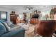 Bright living room with hardwood floors, comfortable seating, and a cozy atmosphere at 832 Donnelly Pl, Daytona Beach, FL 32114