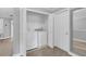 This laundry room offers a side-by-side washer and dryer set and built in shelving at 893 Assembly Ct, Reunion, FL 34747
