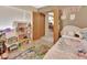 Comfortable bedroom features two closets and adjoining rooms at 910 Braddock Rd, Enterprise, FL 32725