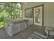 Screened patio features a hot tub and access to backyard at 910 Braddock Rd, Enterprise, FL 32725