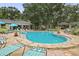 Community pool offers a large tanning deck, lots of seating, and a gazebo for residents at 940 Douglas Ave # 189, Altamonte Springs, FL 32714