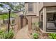 Inviting condo exterior featuring a private entry, natural light, and meticulous landscaping at 940 Douglas Ave # 189, Altamonte Springs, FL 32714