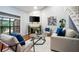Cozy living room showcasing a fireplace, lots of natural light, and modern decor at 940 Douglas Ave # 189, Altamonte Springs, FL 32714