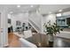 Bright living room with dining area and staircase at 940 Douglas Ave # 189, Altamonte Springs, FL 32714