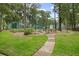 Community tennis courts with manicured lawns and mature trees offer a great active amenity at 940 Douglas Ave # 189, Altamonte Springs, FL 32714
