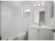 Bathroom featuring a walk-in shower, vanity, and a toilet at 952 N Fairbairn Dr, Deltona, FL 32725