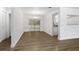 Bright dining room with wood floors, chandelier, and sliding glass door at 952 N Fairbairn Dr, Deltona, FL 32725