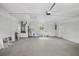 Clean and spacious two-car garage with white painted walls and sealed concrete floor at 952 N Fairbairn Dr, Deltona, FL 32725
