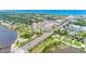 Scenic aerial view of the condo complex, waterfront, golf course, and surrounding neighborhood at 1 John Anderson Dr # 3170, Ormond Beach, FL 32176