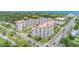 Aerial view of the high-rise condominiums with beautifully manicured lawns and lush landscaping at 1 John Anderson Dr # 3170, Ormond Beach, FL 32176
