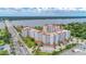 Wide-angle aerial view of the condos, nearby bridge, and Halifax River at 1 John Anderson Dr # 3170, Ormond Beach, FL 32176