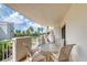 This condo balcony features seating and views of the property, providing an ideal space to unwind at 1 John Anderson Dr # 3170, Ormond Beach, FL 32176