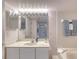Bright bathroom featuring vanity, mirror and combination tub and shower at 1 John Anderson Dr # 3170, Ormond Beach, FL 32176