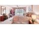 Comfortable bedroom with french doors, ceiling fan, and elegant decor at 1 John Anderson Dr # 3170, Ormond Beach, FL 32176