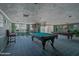 Billiard room featuring two pool tables, high-top seating, and classic decor at 1 John Anderson Dr # 3170, Ormond Beach, FL 32176