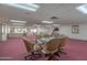 The spacious game room allows residents to gather and play cards or watch TV in a comfortable setting at 1 John Anderson Dr # 3170, Ormond Beach, FL 32176