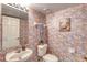 Cozy powder room features decorative floral wallpaper and classic fixtures at 1 John Anderson Dr # 3170, Ormond Beach, FL 32176