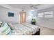 The main bedroom features a ceiling fan and en suite bathroom at 1 John Anderson Dr # 3170, Ormond Beach, FL 32176