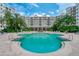 The community pool area has chairs, mature palms, and is a great place to relax and socialize at 1 John Anderson Dr # 3170, Ormond Beach, FL 32176