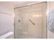 Contemporary walk-in shower with glass door and grab bar at 1 John Anderson Dr # 3170, Ormond Beach, FL 32176