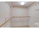 Walk-in closet provides ample storage space with built-in shelving and clothing rods at 1 John Anderson Dr # 3170, Ormond Beach, FL 32176