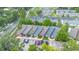 Aerial view of the community with parking and mature landscaping at 101 N Hill Ave # 6, Deland, FL 32724