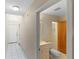 Bathroom with white vanity, tiled floors, and tub with shower at 101 N Hill Ave # 6, Deland, FL 32724