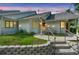 Charming one-story home features inviting entrance with well-kept lawn and decorative stone retaining wall at 101 N Hill Ave # 6, Deland, FL 32724