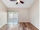 Bright living room with modern flooring and sliding glass doors at 101 N Hill Ave # 6, Deland, FL 32724