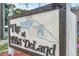 Community sign for The Lofts at DeLand with classic design and neighborhood charm at 101 N Hill Ave # 6, Deland, FL 32724