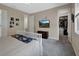 Bedroom features stylish accent wall, attached bathroom and a walk-in closet at 1018 River Falls Cir, Deland, FL 32720