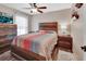 Bright bathroom features a glass shower with a built-in shelf for storage and a metal towel rack at 1020 N Orange Ave, Orange City, FL 32763